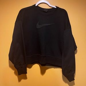 Women’s size large cutoff sweater.